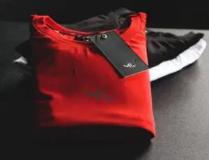 Red T-shirt with a branded black swing tag