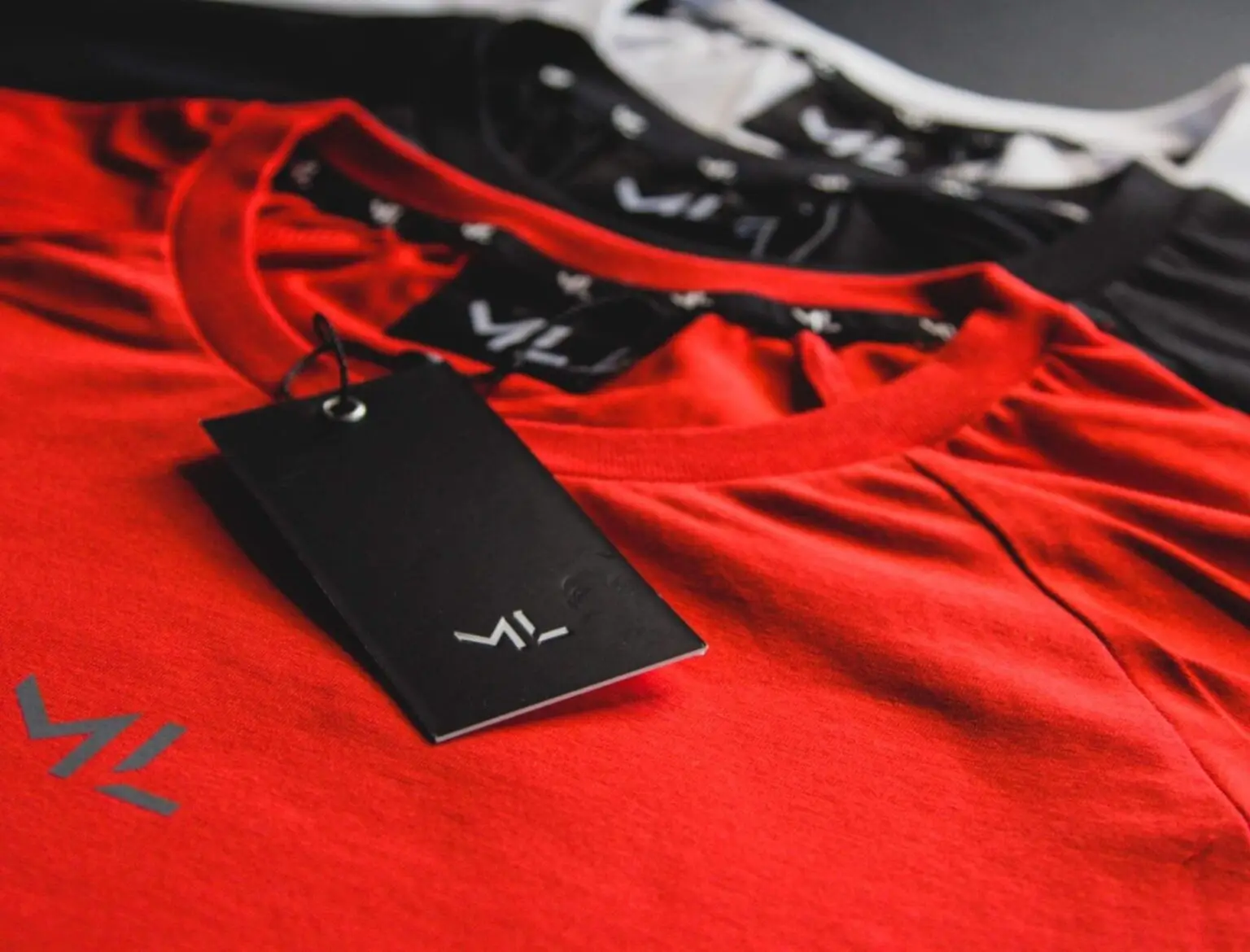 Red T-shirt with a branded black swing tag
